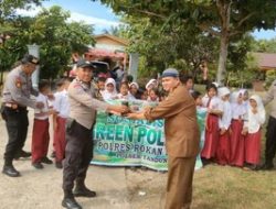 Polres Rokan Hulu Galakkan Green Policing: Tanam Pohon di 21 Sekolah untuk Lingkungan Hijau
