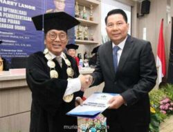 Irjen Roycke Langie Raih Gelar Doktor Cumlaude, Bahas Strategi Pemberantasan TPPO