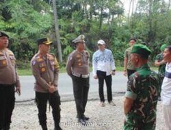 Hujan Lebat Tak Surutkan Semangat Polres Kuansing Layani Pemudik