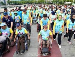 Ribuan Penyandang Disabilitas Serukan Kesetaraan di Fun Walk Bundaran HI