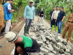 Bupati Yusra Libatkan Warga, Jalan Usaha Tani Bolmong Beri Dampak Ganda