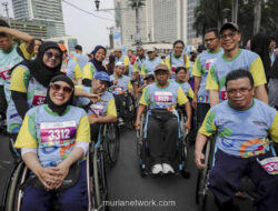 Semangat Inklusif Warnai CFD, Peserta Disabilitas Serahkan Bantuan untuk Korban Bencana