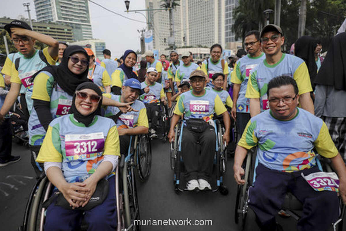 Semangat Inklusif Warnai CFD, Peserta Disabilitas Serahkan Bantuan untuk Korban Bencana