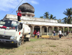 Gotong Royong PMI-DMI Bersihkan Masjid Terendam Banjir Aceh Utara