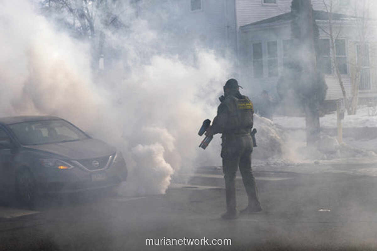 Bentrokan di Minneapolis: Kecelakaan Lalu Lintas Picu Kerusuhan dengan Agen Federal