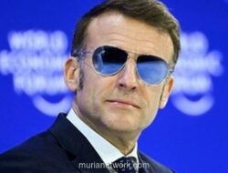 Macron Berpidato dengan Kacamata Hitam di Davos, Trump Langsung Sindir