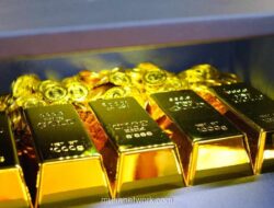 Harga Emas Dunia Koreksi, Tetap Bertahan di Atas USD 5.000