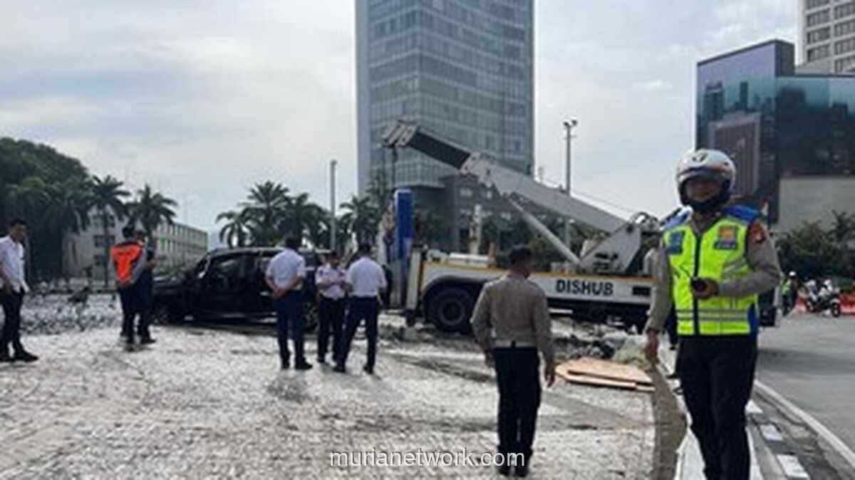 Polisi Sebut Kelalaian Pengemudi Jadi Penyebab Taksi Online Nyemplung ke Kolam Bundaran HI