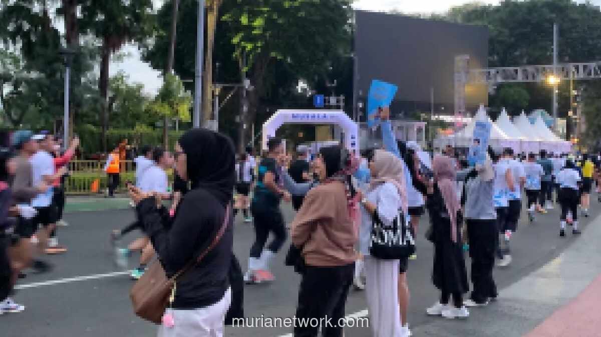Ribuan Pendukung Padati Bundaran HI untuk Semangati Pelari BTN Jakarta International Marathon 2026