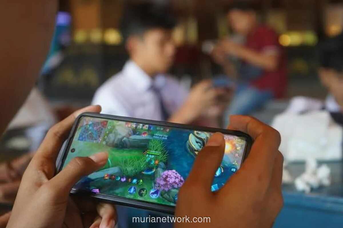 IPOT Ajar Gen Z Investasi Lewat Game Mobile Legends di Turnamen eSports