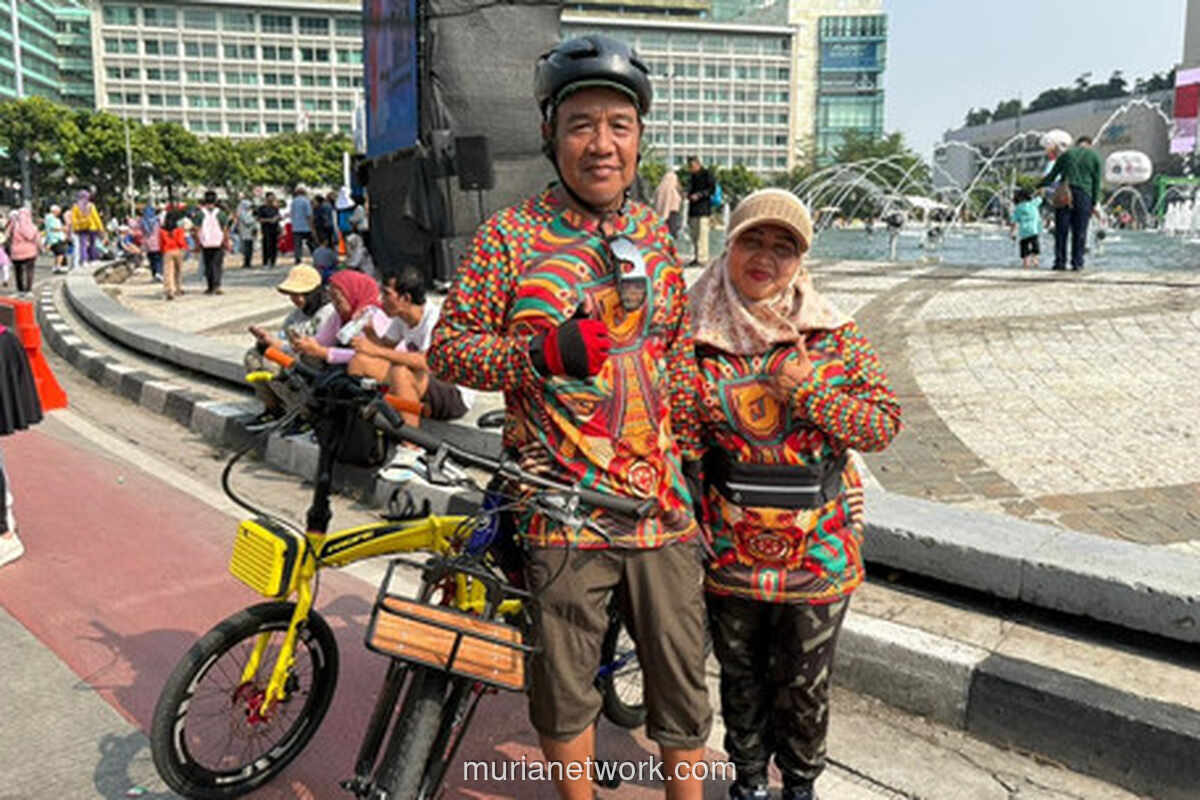Bersepeda Puluhan Kilometer demi HUT Jakarta, Pasutri dari Tangerang Ini Ketagihan Gowes