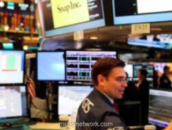 Wall Street Beragam di Tengah Penurunan Harga Minyak dan Sikap Wait-and-See Jelang Keputusan Suku Bunga Fed