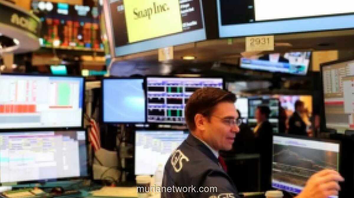 Wall Street Beragam di Tengah Penurunan Harga Minyak dan Sikap Wait-and-See Jelang Keputusan Suku Bunga Fed