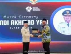 Bupati Gresik Raih Penghargaan atas Perlindungan Anak Pekerja Migran