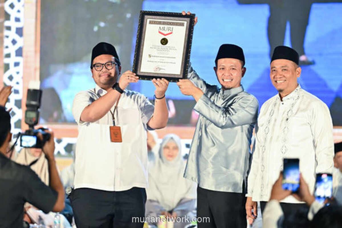 Pemkot Pekanbaru Raih Rekor MURI Pembacaan Surah Al-Mulk oleh 9.184 ASN