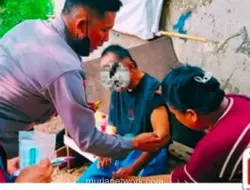 Polsek Pesanggrahan Evakuasi Pria Basah Kuyup di Kali Uangan