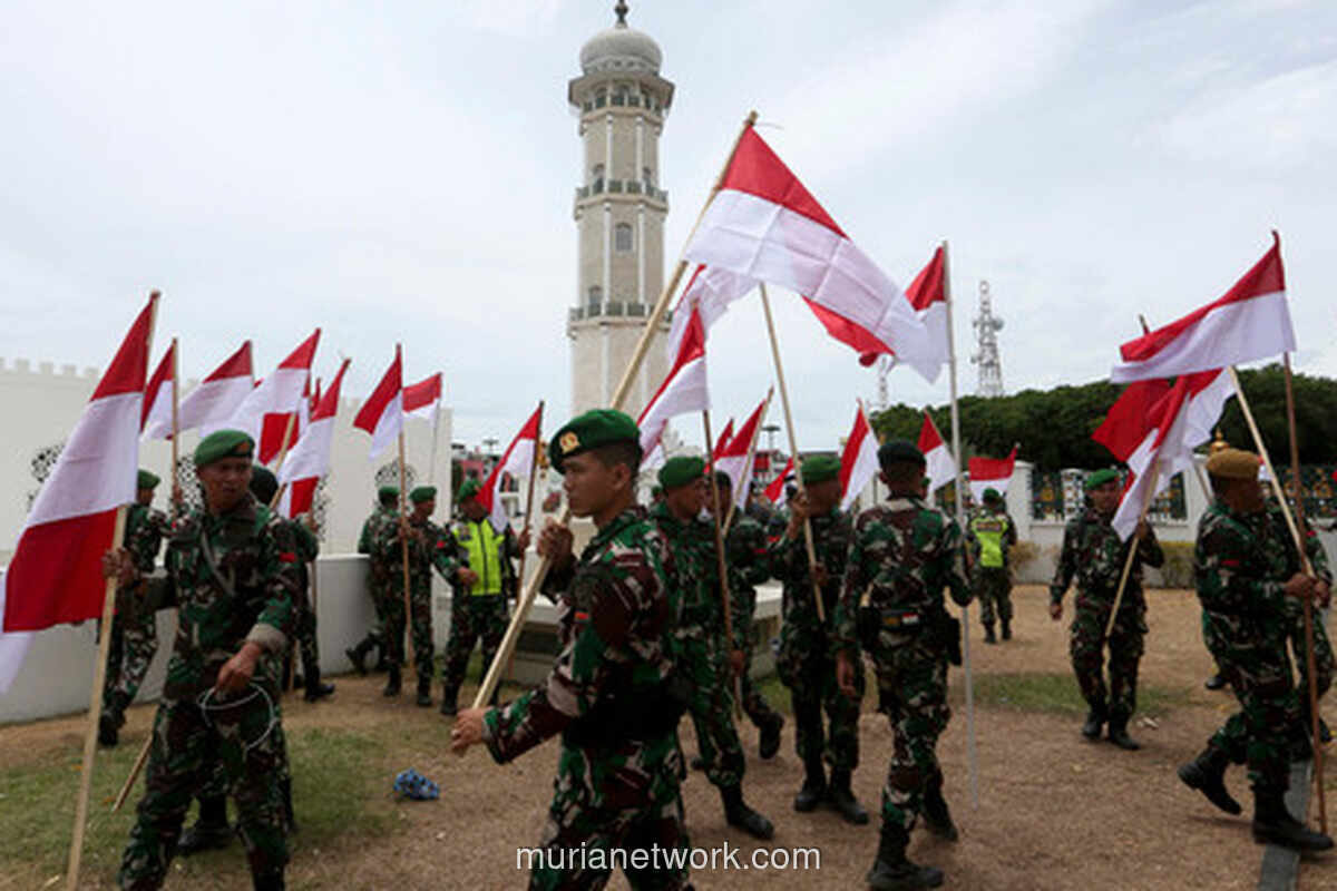 Bendera Merah Putih Kembali Berkibar di Baiturrahman Usai Kericuhan